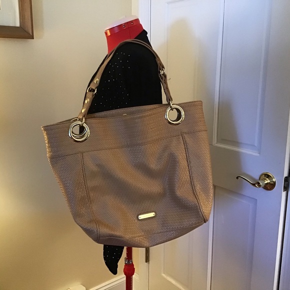 Steve Madden Handbags - Steve Madden large shoulder bag in creamy gold color with gold accents.